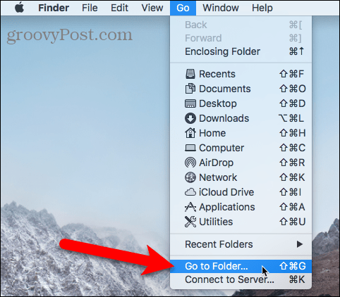 Selectați Go to Folder in Finder pe Mac