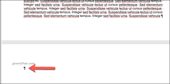 Un semn de paragraf pe o pagină goală Word