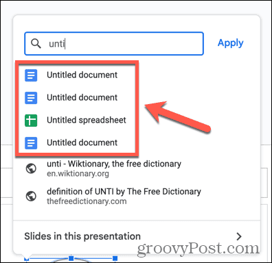 Google Slides link către alte documente