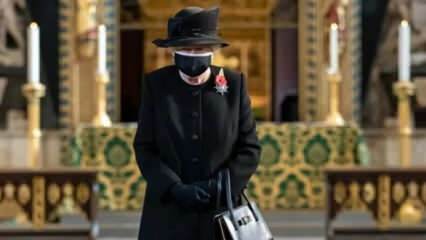 Regina Elisabeta a fost arătată într-o mască pentru prima dată în public!